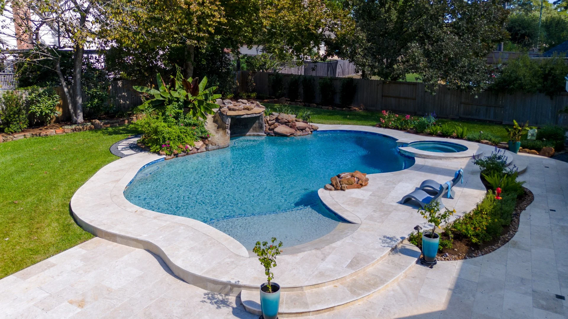 Jewel Pools & Outdoor Living workers building a walkway.