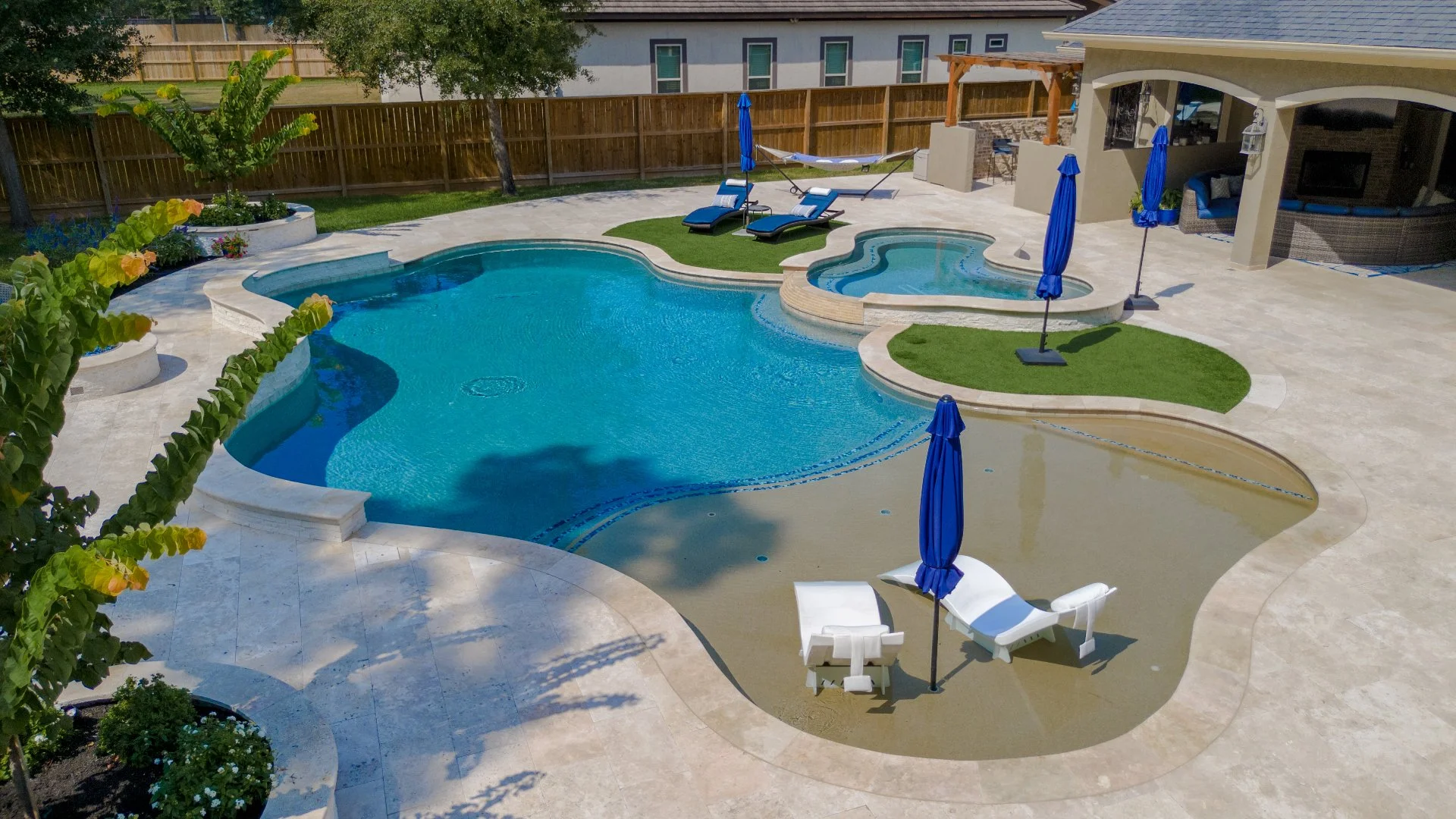 Jewel Pools & Outdoor Living workers building a walkway.
