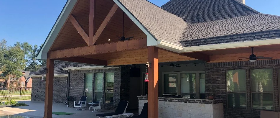 Roof extension over a patio space in Kingwood, TX.