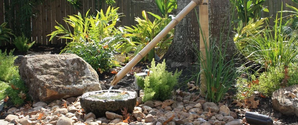 Unique water feature in a rock bed in Kingwood, TX.
