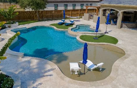 Swimming pool in %%targetarea1-ks%%, %%state-ks%%, with a paver patio and seating.